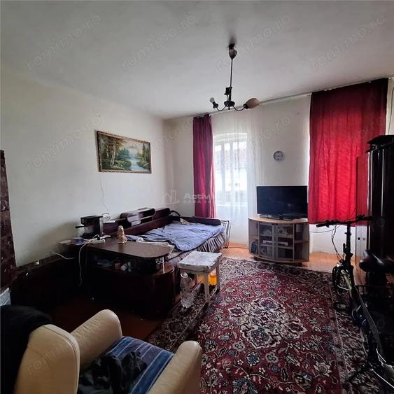 Casă cu 4 camere cu Teren 1000 Mp în Est