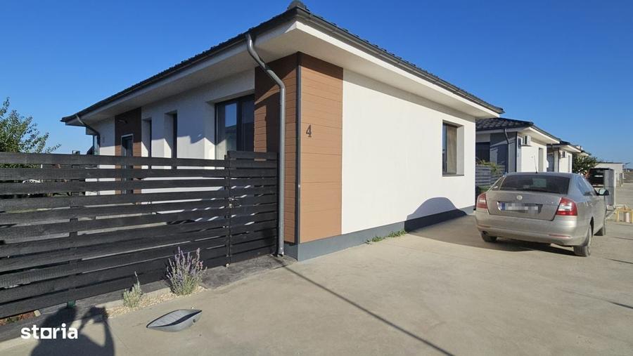 Casă cu 4 camere cu Teren 338 Mp în Tunari