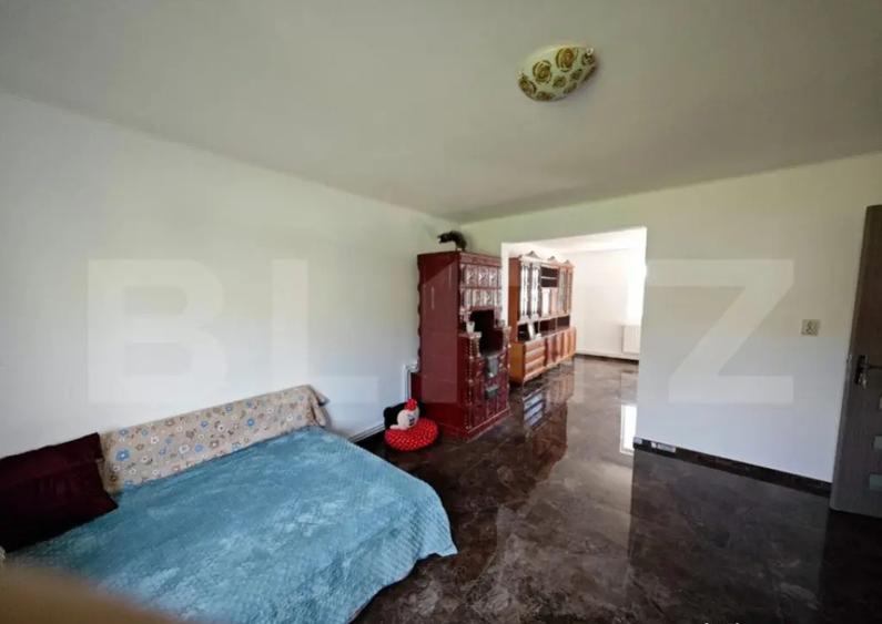 Casa cu 4 camere, 105 mp utili, cu garaj si 500 mp teren, zo - 6