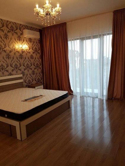 Casa individuala cu 5 camere, demisol cu garaj. - 11