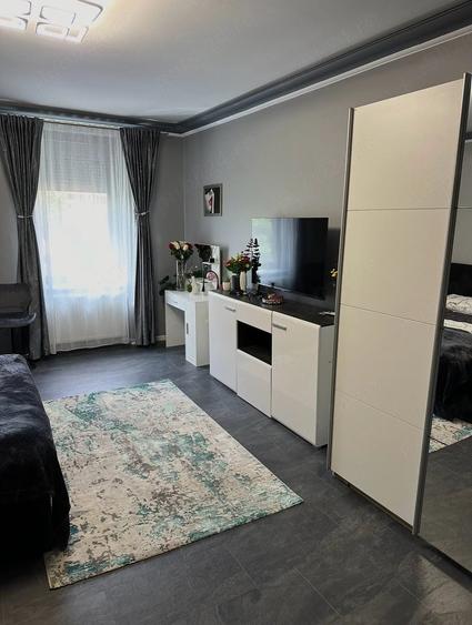 Apartament cu 2 camere semidecomandat în Badea Cârțan