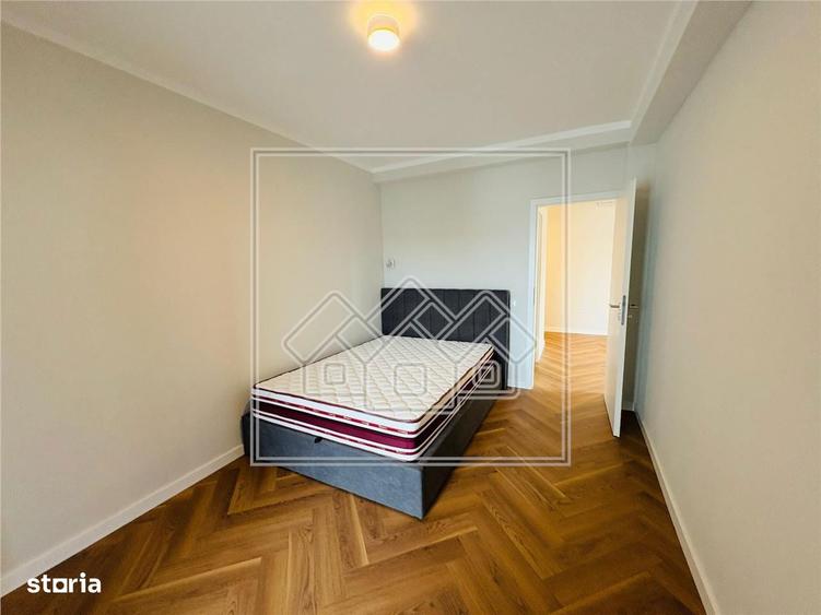 Ap. 3 camere, 2 bai si terasa 15,44 mp - decomandat - prima inchiriere - 5