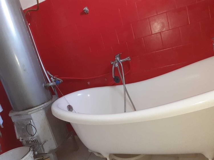 Casă cu 4 camere cu Teren 2000 Mp în Buteni