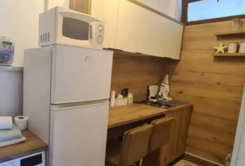 garsonieră zona trocadero  mobilată utilată 25 mp etaj 1/4 - 2