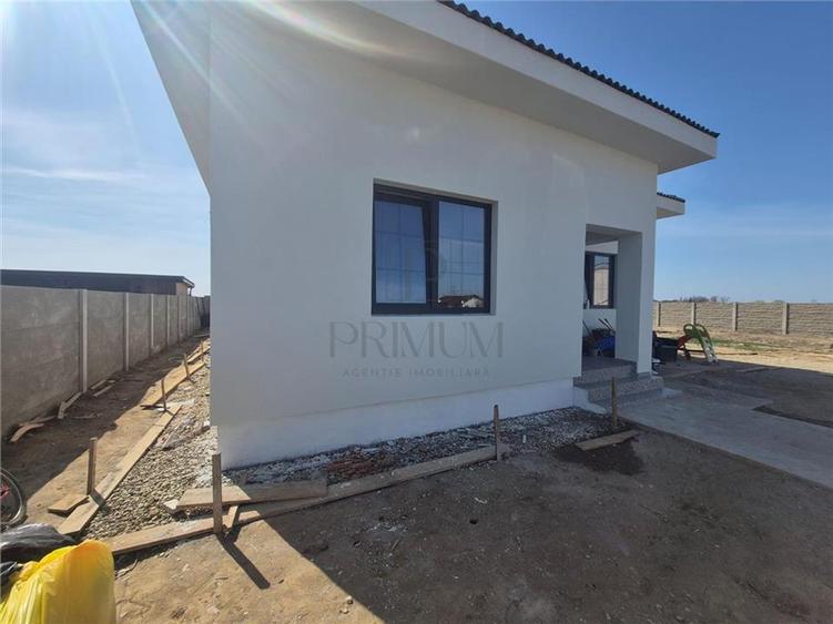 Casa individuala - parter - 3 dormitoare - finalizata - teren foarte mare - 4