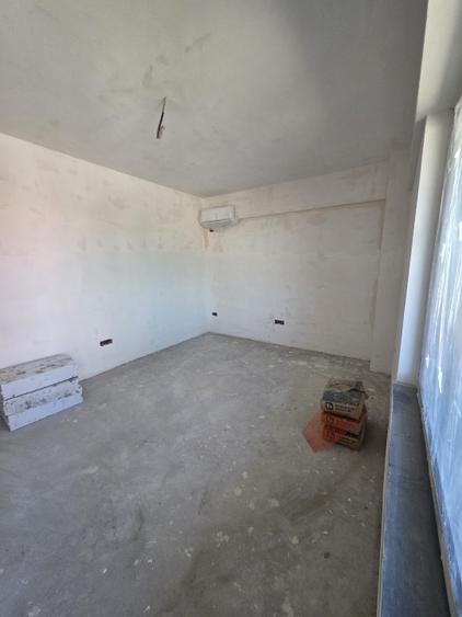 BLOC NOU apartament cu 2 camere 63.35m² de vanzare, ZONA CENTRALA Podu Ros- Bld. - 12
