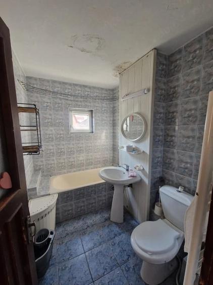Apartament cu 3 camere decomandat în Buduș