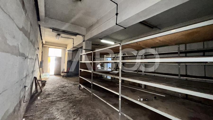 Spatiu pentru depozitare magazinare de inchiriat cu birou 102mpu Sibiu - 1