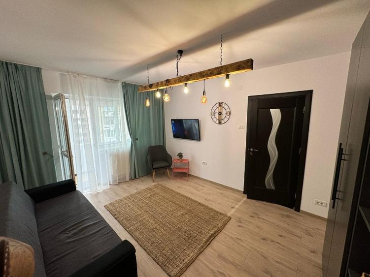 Ofer spre inchiriere  garsoniera 400E - 1