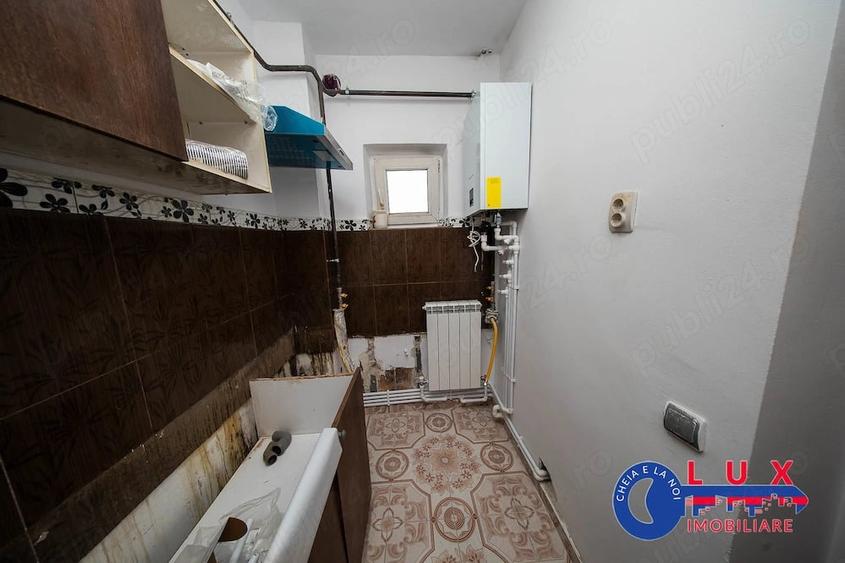 ID 59 DE INCHIRIAT: Garsoniera confort 1 - 5