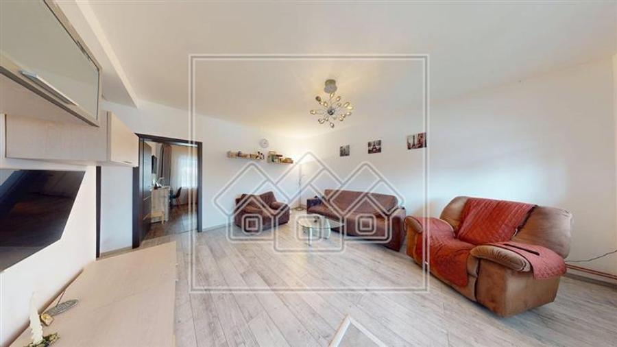 Apartament de vanzare in Sibiu - 67 mp utili, 147 mp teren - - 2