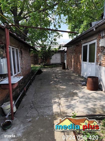 Casa cu teren 1374 mp in vatra veche a comunei Vanatori 56.000 Euro - 9