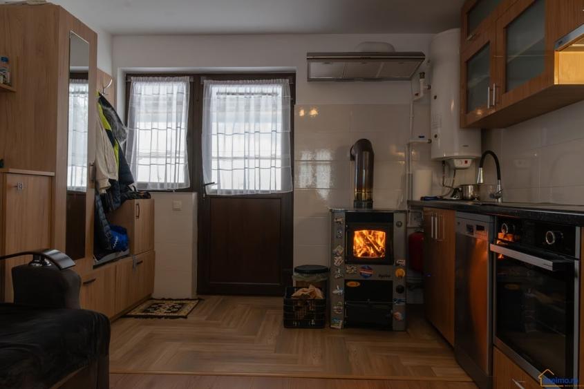 Vrei o casa mica la tara, cu tot confortul din oras? Oportunitate in Stanesti! - 11