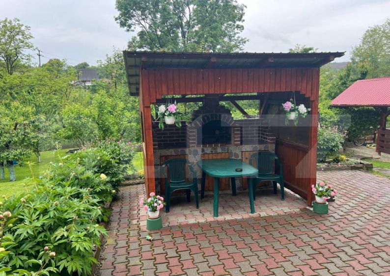 Casa de lemn cu teren generos 1500 mp in Cerghid, lini - 4