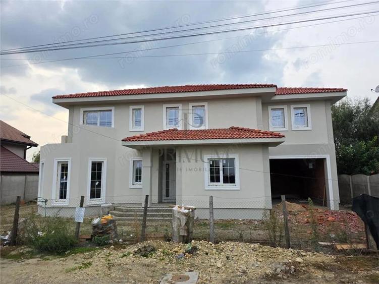 Casa individuala superba - teren 730 mp - garaj - 5 dormitoare - living 57mp. - 3