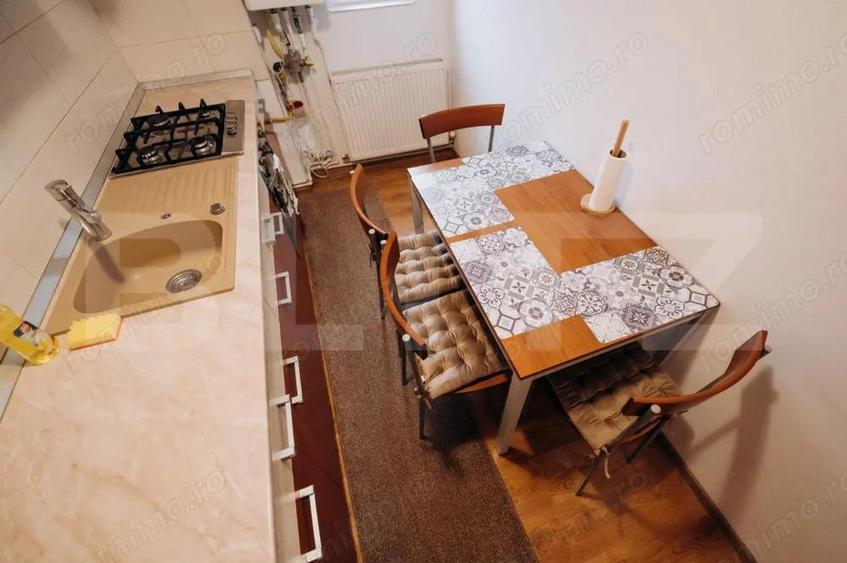 Oportunitate rara Garsoniera moderna cu parcare ?i curte | Podu Ro? Granit - 1