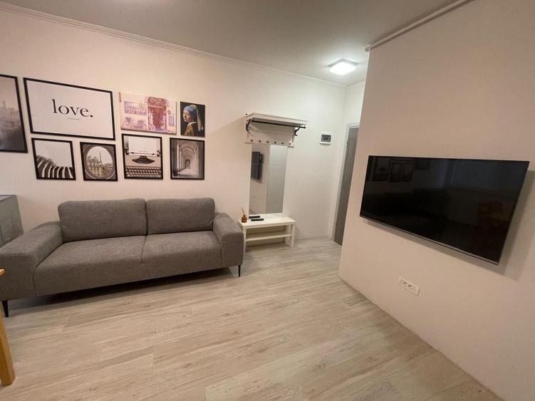 Apartament cu 3 camere semidecomandat, mobilat în Giroc