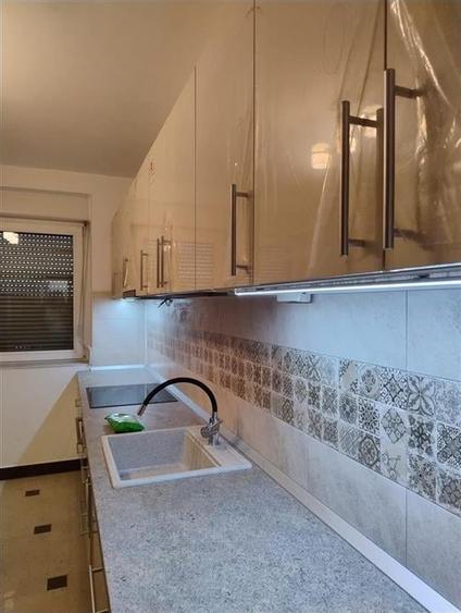 RECO Apartament cu 3 camere in Beius - 2