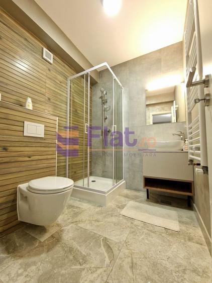 Apartament cu 3 camere decomandat în Tractorul