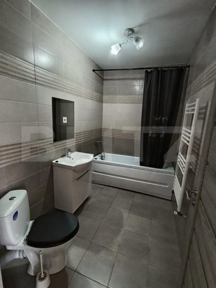 Apartament cu 2 camere semidecomandat, mobilat în Florești