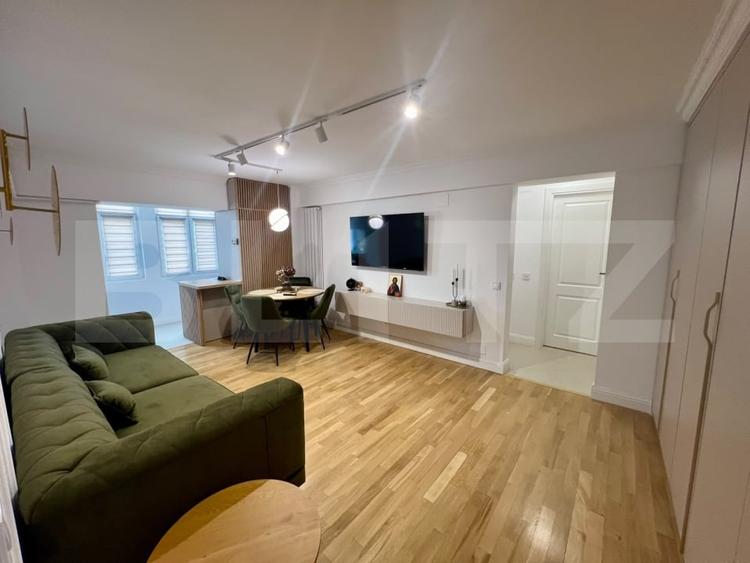 Apartament cu 3 camere semidecomandat, mobilat în Ultracentral