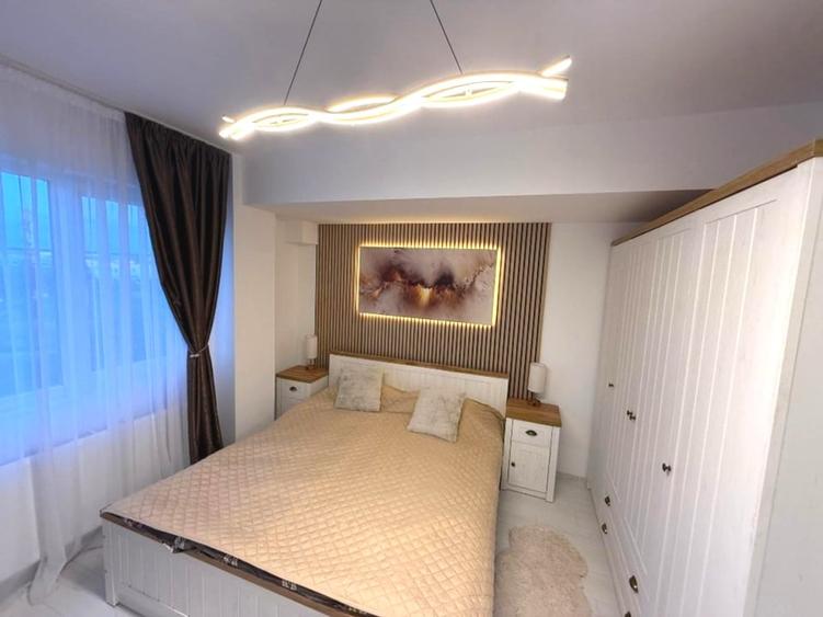 Apartament cu 3 camere semidecomandat, mobilat în Otopeni