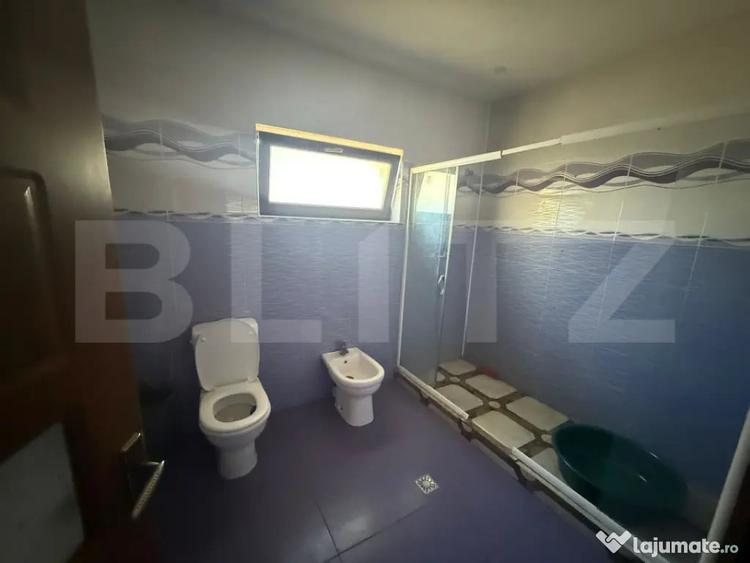 Casă cu 9 camere cu Teren 1000 Mp în Central