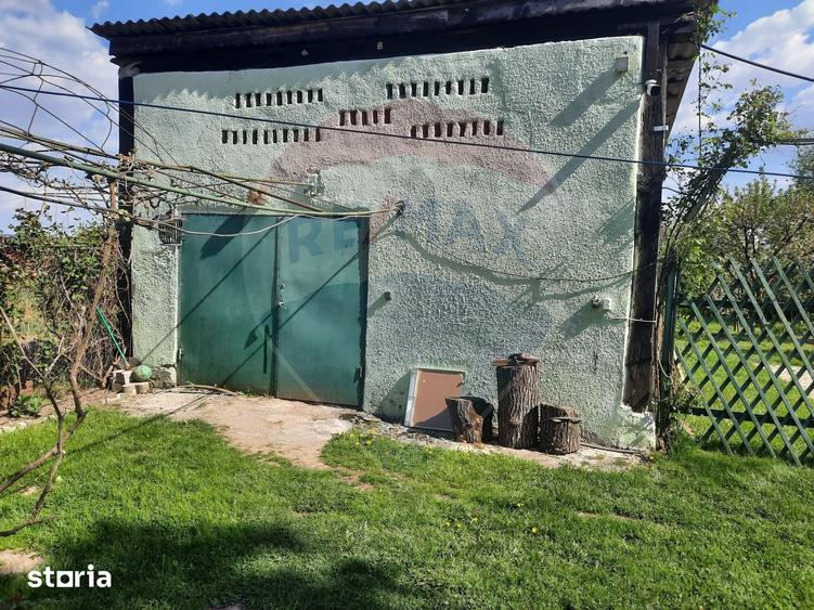 Casă cu 2 camere cu Teren 1836 Mp în Beclean