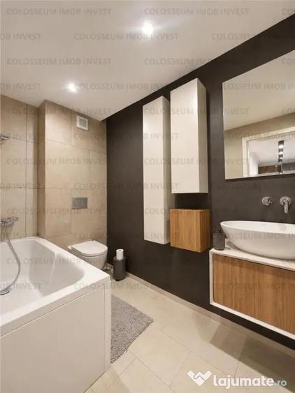 Apartament cu 3 camere decomandat în Tractorul