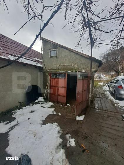 Casă cu 2 camere cu Teren 1400 Mp în Central