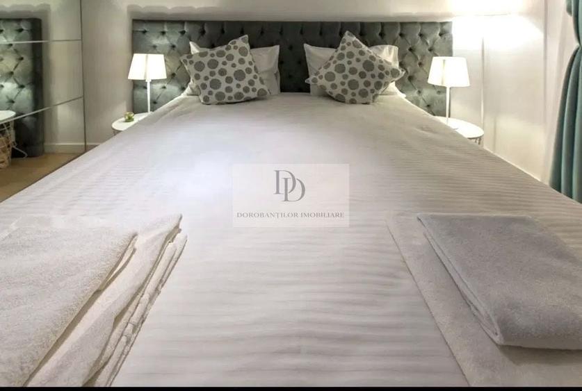 Apartament cu 3 camere semidecomandat, mobilat în Central