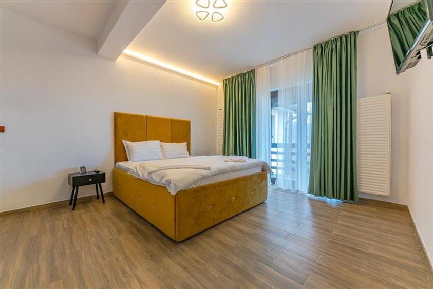 Casă individuală cu 8 camere cu Teren 1100 Mp în Bran