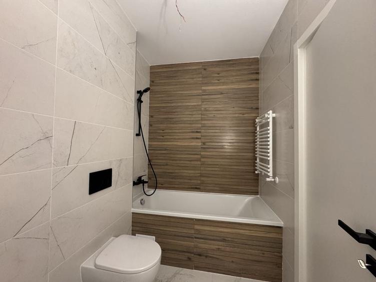 Apartament cu 2 camere decomandat în Cățelu