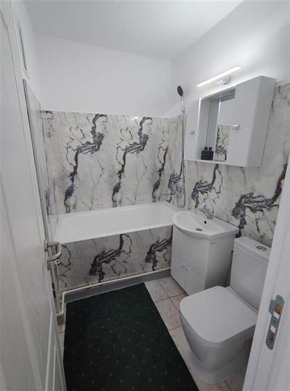 Apartament cu 2 camere semidecomandat în Podu Roș