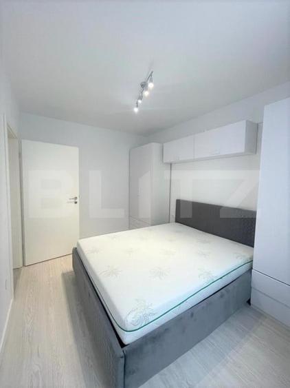 Apartament cu 2 camere semidecomandat, mobilat în Chinteni