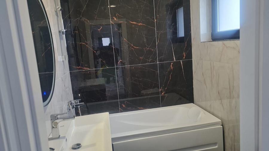 Casă individuală cu 4 camere cu Canalizare în Tunari