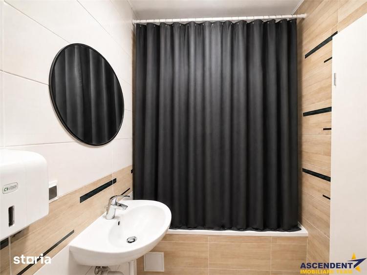 Apartament cu 3 camere decomandat în Tractorul