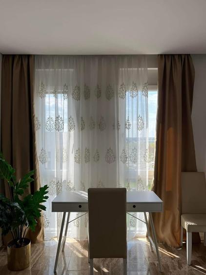 Apartament cu 3 camere decomandat în Europa