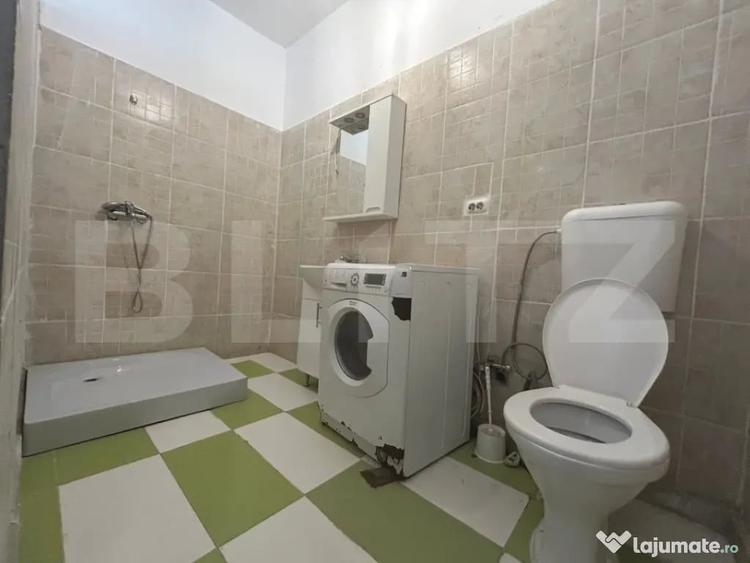 Casă cu 4 camere cu Teren 100 Mp în Central