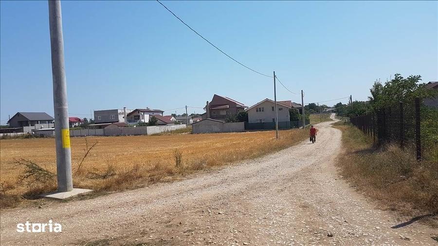 TEREN INTRAVILAN 469 MP. LANGA CASE ZONA DE PERSPECTIVA PRET 17.500 E - 10