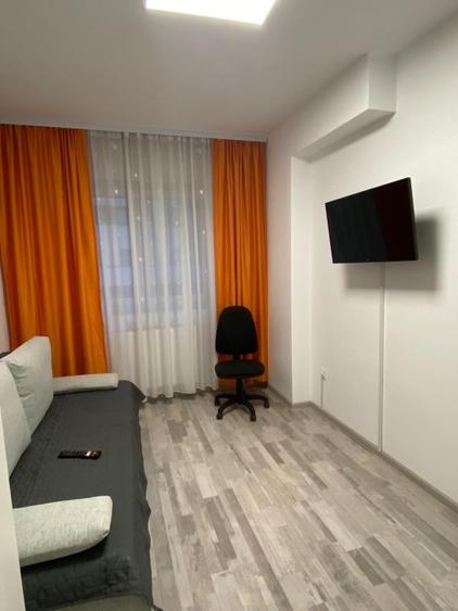 Apartament cu 3 camere decomandat în Tractorul
