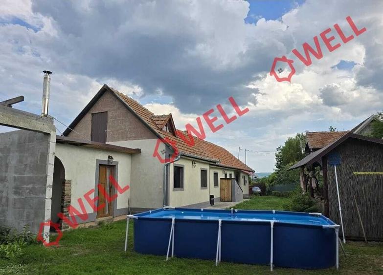 Casă cu 4 camere cu Teren 1102 Mp în Sântionlunca