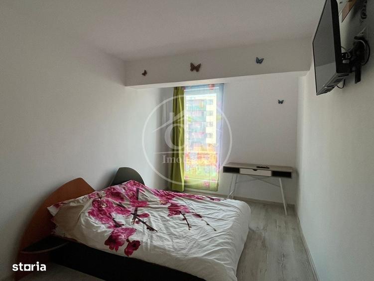 Apartament cu 4 camere decomandat în Rontău