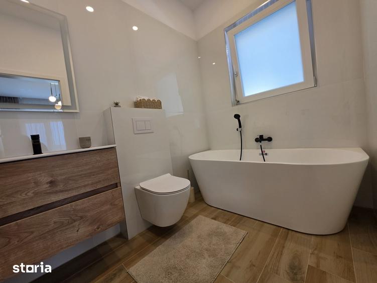 Casă cu 4 camere cu Teren 500 Mp în Tunari