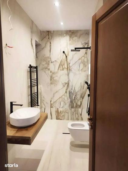 Apartament in Busteni Zamora terasa, curte interioara finisaje premium - 1