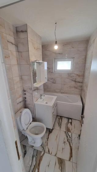 Apartament cu 3 camere semidecomandat în Livada