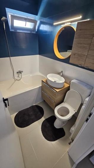 Apartament cu 2 camere semidecomandat, mobilat în Central