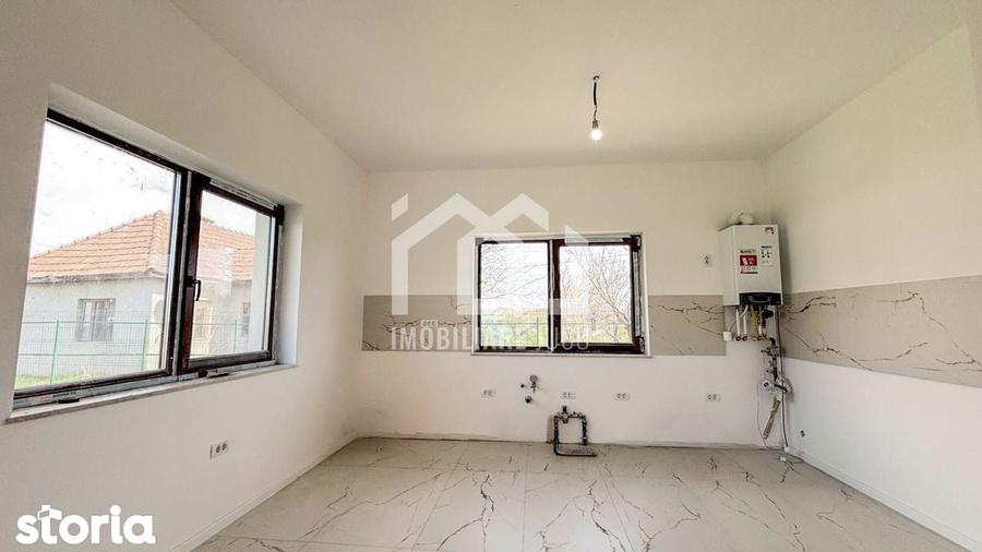 Casă cu 4 camere cu Teren 750 Mp în Jucu