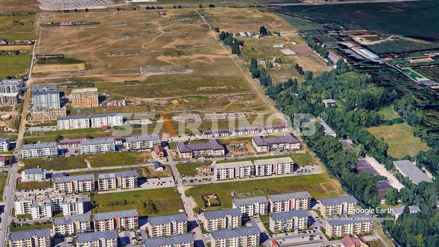 Teren Construcții intravilan de 2000 mp, în Tractorul