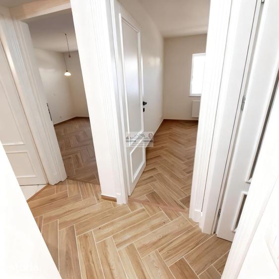Apartament cu 4 camere decomandat în Străoane